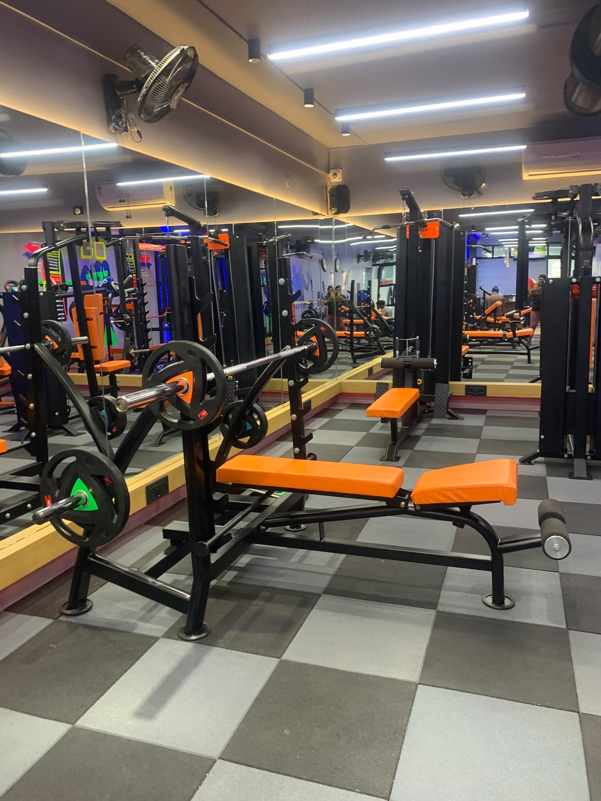 Premium locker room with wooden lockers and changing area